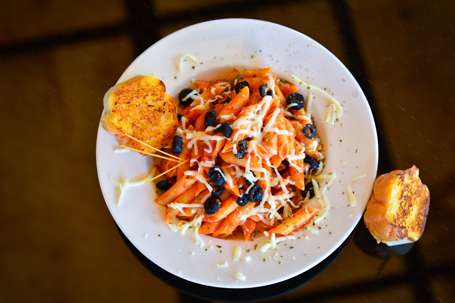 Macaroni Pasta With Red Sauce on White Plate