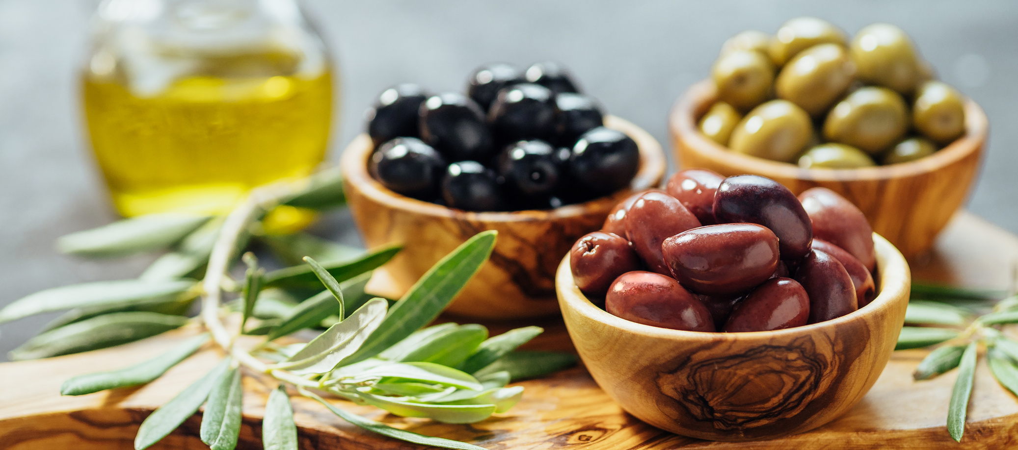 Set of Olives and Olive Oil on the Table